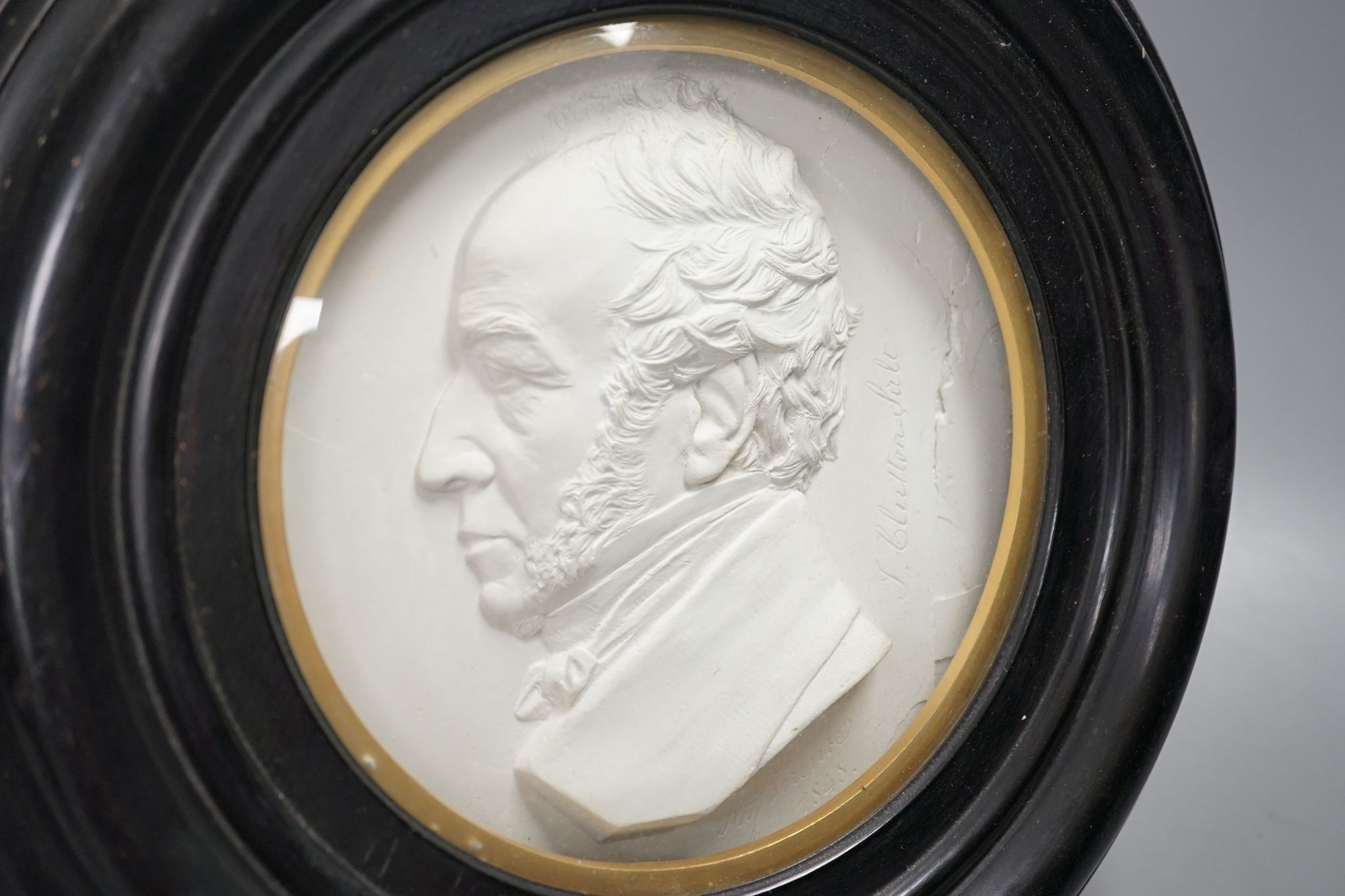 A 19th century cast plaster relief rounded portrait of Thomas Clutton Salt, lamp maker of Brimingham (af)